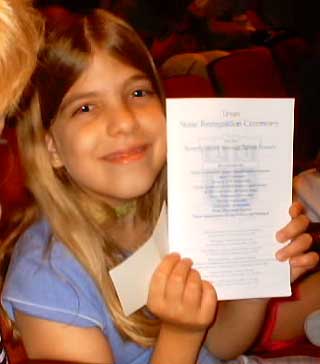Diane with program at A&M