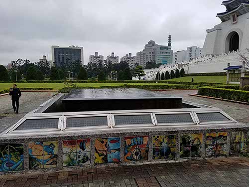 Liberty Square... this included the National Theater, National Concert Hall, Freedom Park, and Chang Kai-shek memorial. We saw the changing of the guard, and wandered the gardens, by the lily ponds, waterfall, bridges, and koi.